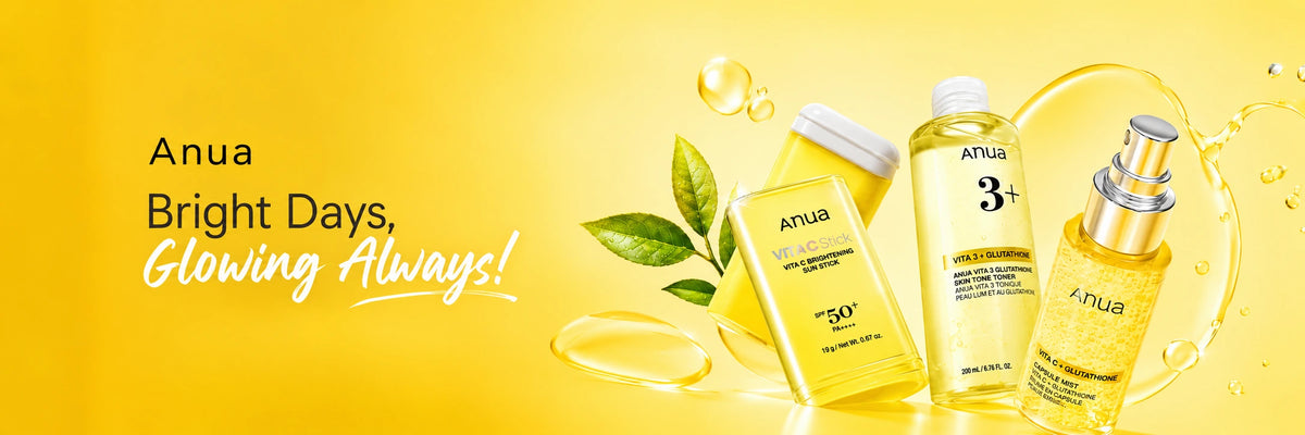 Anua Vita C collection on a sunny yellow background.