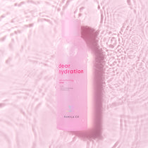 Dear Hydration Skin Softening Toner - bottle on pink background
