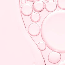 Elroel Prestige Collagen Lifting Emulsion: pink fluid texture with droplets and bubbles