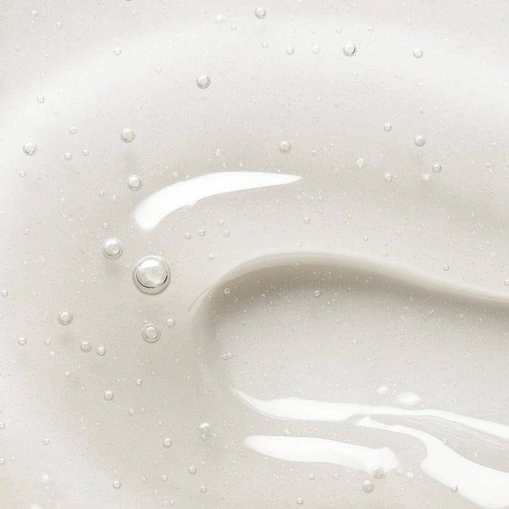 epii New Skin Toner Snow Mushroom & PHA — Gently exfoliates with 5% PHA to improve the look of uneven texture; texture close-up.