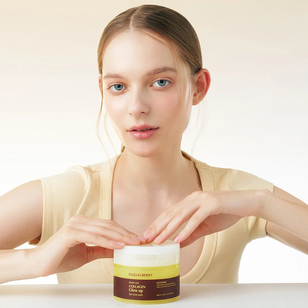 Eqqualberry BOUNCY DAY Collagen Glow Up Gel Toner Pads — Supports smoother-looking texture and moisture-barrier care; | Model with the glow toner pad jar