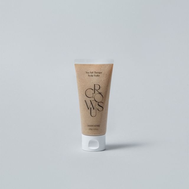 Growus Sea Salt Therapy Scalp Scaler 120g tube on a light neutral background