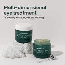 Heimish Marine Care Eye Cream - 30ml — two 30 ml eye-cream jars arranged with a stone in soft light.