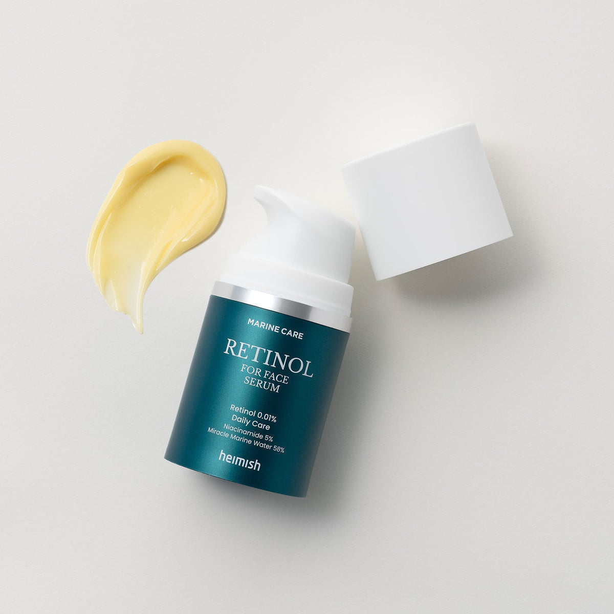 Heimish Marine Care Retinol For Face Serum 50ml — bottle and yellow serum swatch