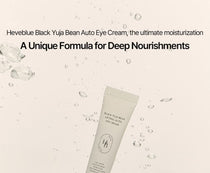 Heveblue Black Yuja Bean Lifting Auto Eye Cream 15 ml — tube surrounded by water droplets.