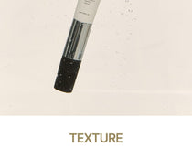 Heveblue Black Yuja Bean Lifting Auto Eye Cream 15 ml — cream texture on the applicator.
