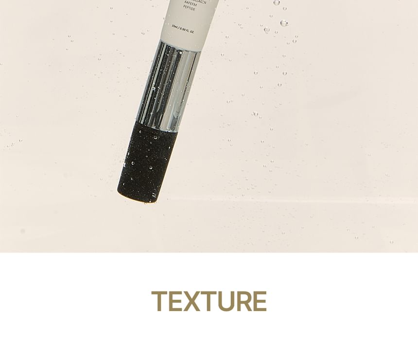 Heveblue Black Yuja Bean Lifting Auto Eye Cream 15 ml — cream texture on the applicator.