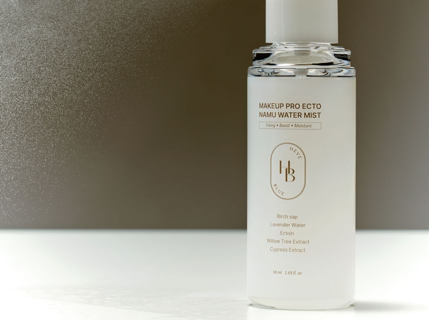 Heveblue Makeup Pro Ecto Namu Water Mist 50 ml — bottle in a sunlit setting.
