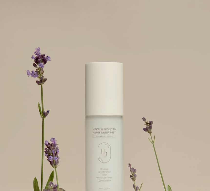 Heveblue Makeup Pro Ecto Namu Water Mist 50 ml — bottle beside lavender.