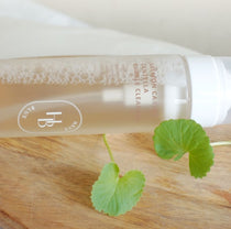 Heveblue Salmon Caring Centella Bubble Cleanser 200 ml — cleanser bottle with centella leaves.