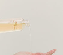 Heveblue Salmon Caring Centella Light Cleansing Oil - 250ml — oil dispensed toward the palm.