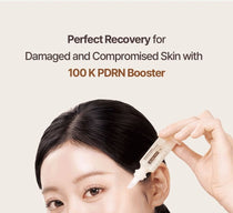Heveblue Salmon Caring Newpair PDRN Booster 100,000 Shot Essence 5 ml — model holding the booster.