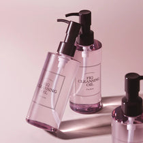 I'm From Fig Cleansing Oil — original bottles on a pink background
