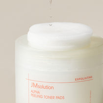 JMsolution Alpha Peeling Toner Pads — open jar and soaked pads