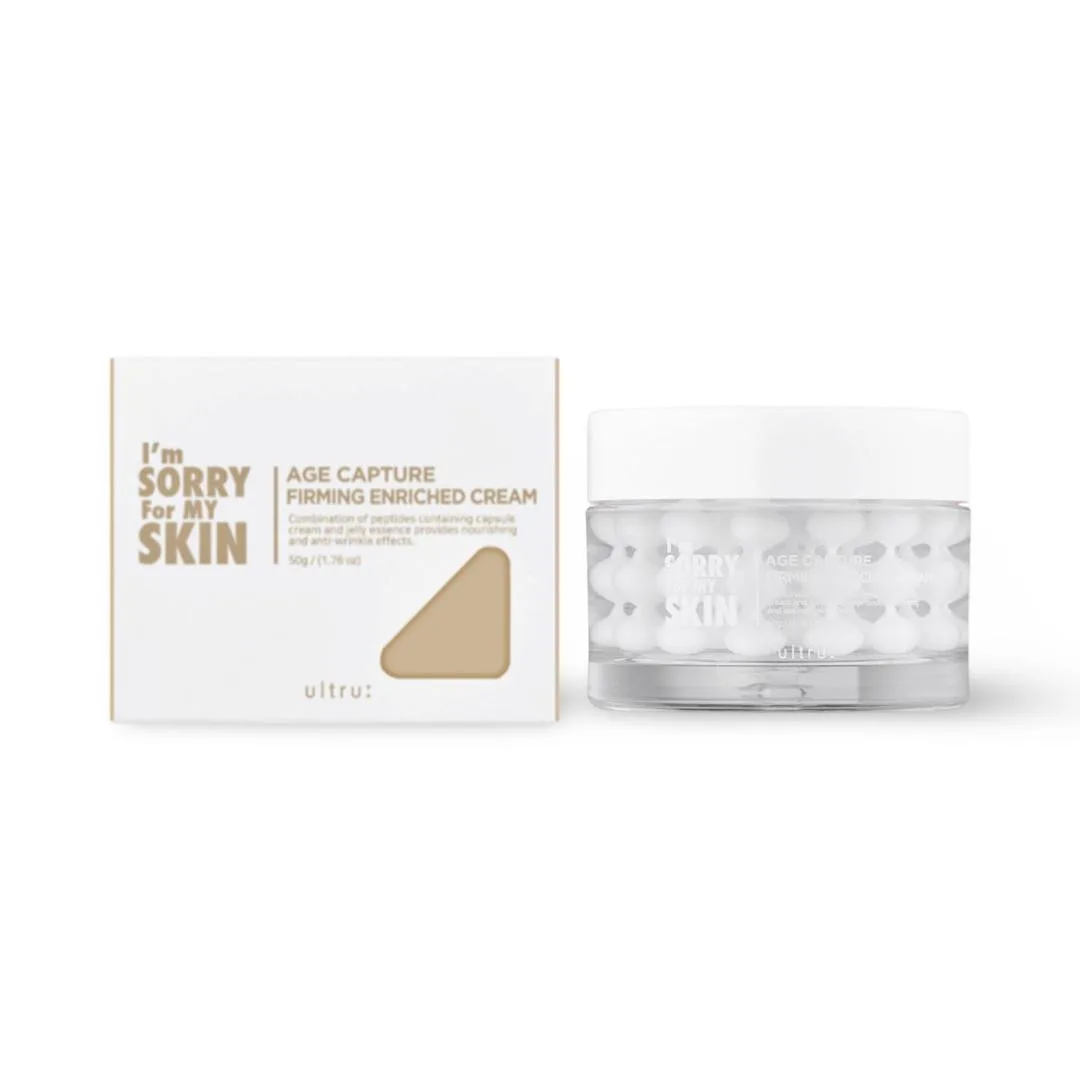 <h2>I’m Sorry For My Skin AGE Capture Firming Enriched Cream 50g</h2> <h3>Overview</h3> <p>The <strong>I’m Sorry For My Skin AGE Capture Firming Enriched Cream</strong> is an anti-aging cream designed to firm, nourish, and revitalize mature skin. It helps improve elasticity, reduce the appearance of fine lines and wrinkles, and provide deep hydration for a smoother, youthful complexion.</p> <h3>Benefits</h3> <ul> <li><strong>Firming:</strong> Enhances skin elasticity and tightens sagging areas.</li> <li><strong>Nourishing:</strong> Provides deep hydration and essential nutrients to the skin.</li> <li><strong>Anti-Aging:</strong> Helps reduce fine lines and wrinkles for a youthful look.</li> <li><strong>Soothing:</strong> Gentle formula suitable for sensitive skin while improving texture.</li> </ul> <h3>How to Use</h3> <ol> <li>After cleansing and toning, take an appropriate amount of the cream.</li> <li>Apply evenly to the face and neck.</li> <li>Gently massage in upward circular motions until fully absorbed.</li> <li>Use daily, preferably in the evening for optimal results.</li> </ol> <h3>Key Ingredients</h3> <ul> <li><strong>Peptides:</strong> Promote collagen production and improve firmness.</li> <li><strong>Niacinamide:</strong> Enhances skin barrier and brightens skin tone.</li> <li><strong>Hyaluronic Acid:</strong> Provides deep hydration and plumps the skin.</li> <li><strong>Botanical Extracts:</strong> Nourish, soothe, and protect skin from oxidative stress.</li> </ul> <h3>Short Description (EN)</h3> <p>Firming anti-aging cream that nourishes and hydrates mature skin.</p> <p>Reduces fine lines, improves elasticity, and revitalizes skin for a youthful glow.</p> <h3>Meta (EN)</h3> <p><strong>Meta Title:</strong> I’m Sorry For My Skin AGE Capture Firming Enriched Cream | Anti-Aging & Firming | %sitename%</p> <p><strong>Meta Description:</strong> Nourish and firm your skin with I’m Sorry For My Skin AGE Capture Cream. Reduces fine lines and improves elasticity. Shop now!</p> <h3>Tags (EN)</h3> I’m Sorry For My Skin, AGE Capture Firming Enriched Cream, Cream, Anti-Aging, Firming, Hydrating, Peptides, Niacinamide, Hyaluronic Acid